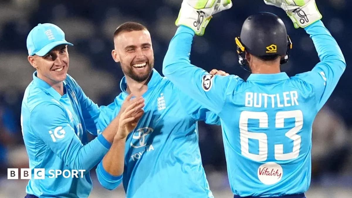 Jugadores de cricket celebrando una victoria en equipo