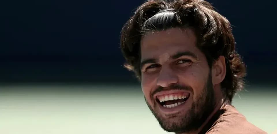 Jugador sonriendo durante una sesión de entrenamiento