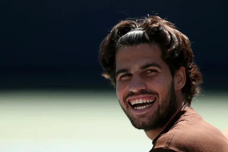 Jugador sonriendo durante una sesión de entrenamiento