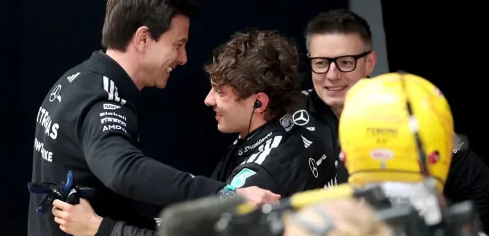 Toto Wolff congratulating young driver after race