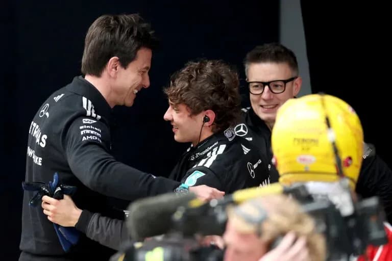 Toto Wolff congratulating young driver after race