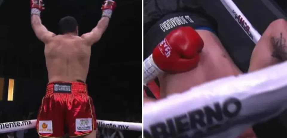 Boxeador levantando los brazos tras victoria contundente