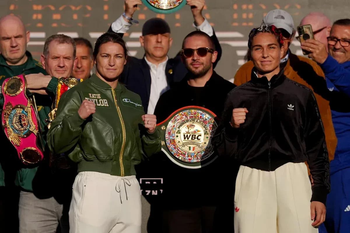 Katie Taylor y rival en ceremonia de pesaje con cinturones