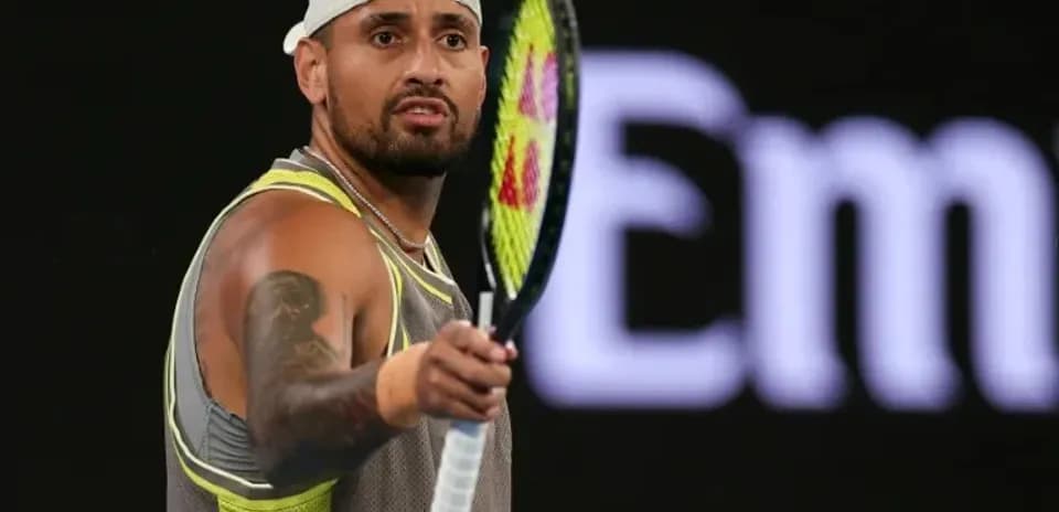 Nick Kyrgios gesturing during tennis match