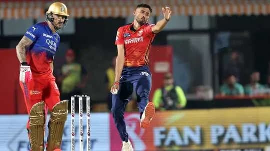 Bowler appealing while batsman looks on during match