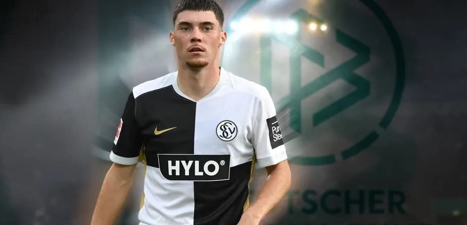 Jugador en uniforme de fútbol frente al logo de la Bundesliga