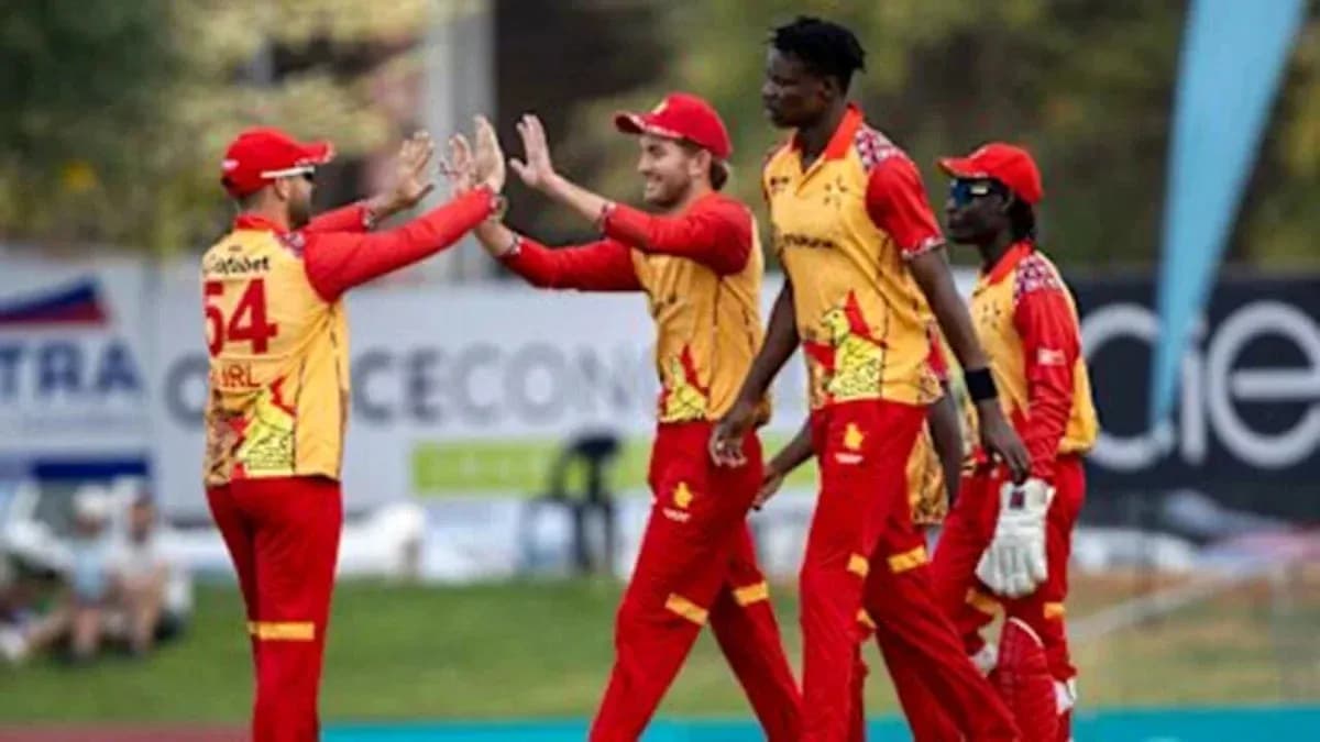 Jugadores celebrando un wicket en el cricket