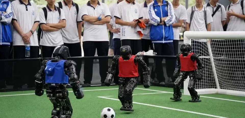 Robots playing soccer on a mini field