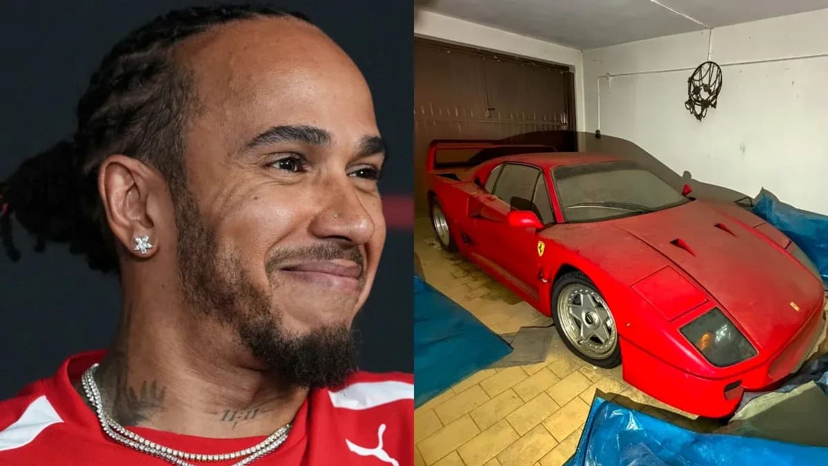 Lewis Hamilton smiling next to a covered Ferrari F40