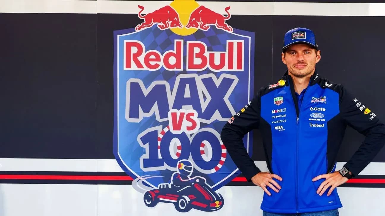 Piloto posando frente a mural de Red Bull Piloto posando frente a mural de Red Bull