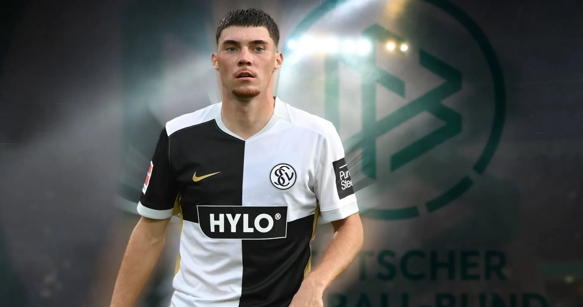 Jugador en uniforme de fútbol frente al logo de la Bundesliga Jugador en uniforme de fútbol frente al logo de la Bundesliga