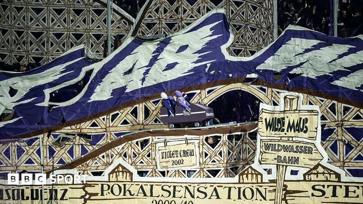 Tifo display with roller coaster theme at stadium Tifo display with roller coaster theme at stadium